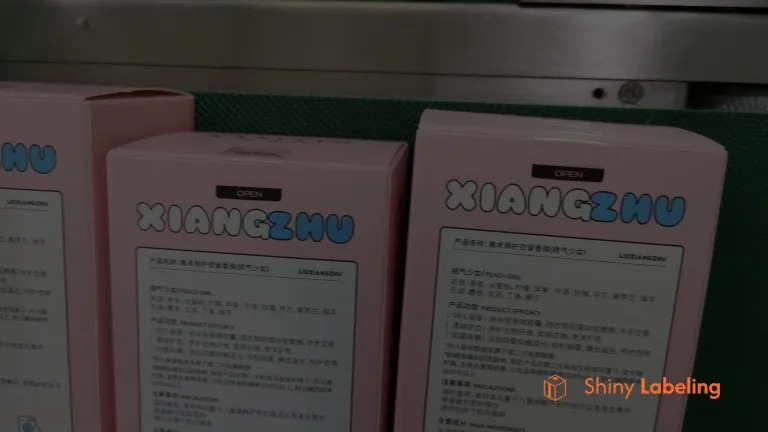Cosmetic box corner labeling machine applied for cosmetic packaging, skincare carton edge labeling, and beauty product traceability system