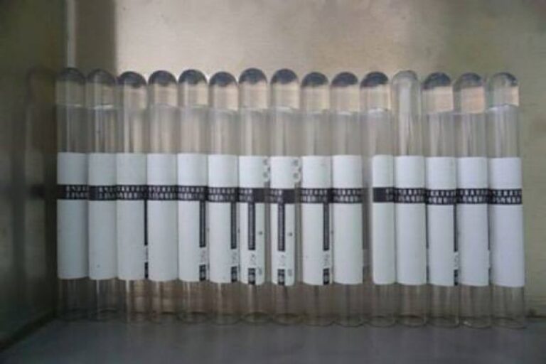 Labeled test tube with automatic labeling machine for laboratory, medical and biomedical sample packaging applications