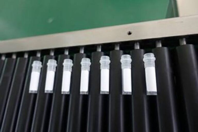 Labeled medicine tube with automatic labeling machine for pharmaceutical, laboratory and medical sample packaging applications