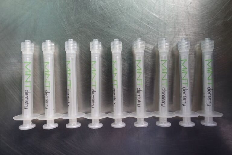 Labeling of disposable syringes with automatic labeling machine for pharmaceutical and medical device packaging applications