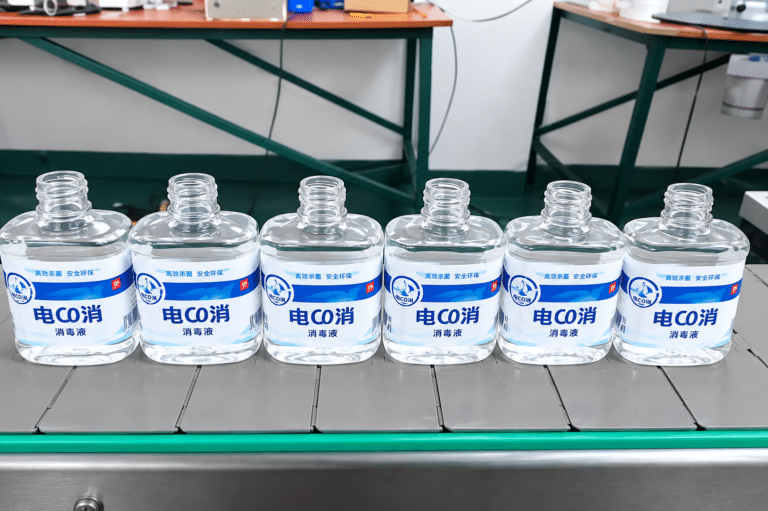 Labeled polygon liquor bottles with wrap-around self-adhesive labels