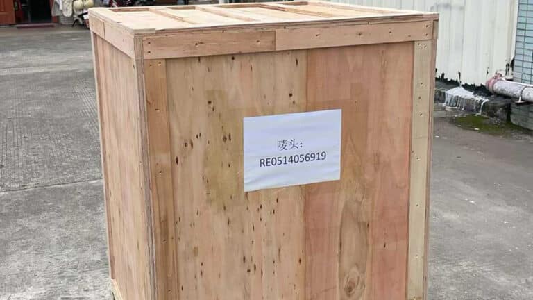 Industrial labeling system secured in wooden export packaging